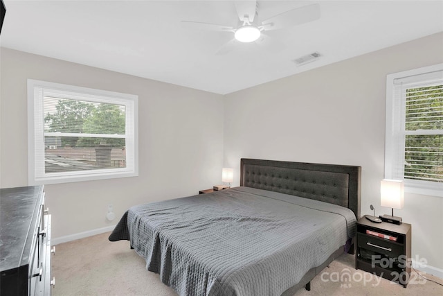 15804 Fairfield Dr, Matthews, NC 28104 - bedroom with carpet floors, multiple windows, and ceiling fan