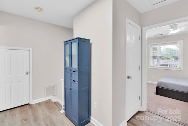 15804 Fairfield Dr, Matthews, NC 28104 - corridor featuring light wood-style floors and baseboards