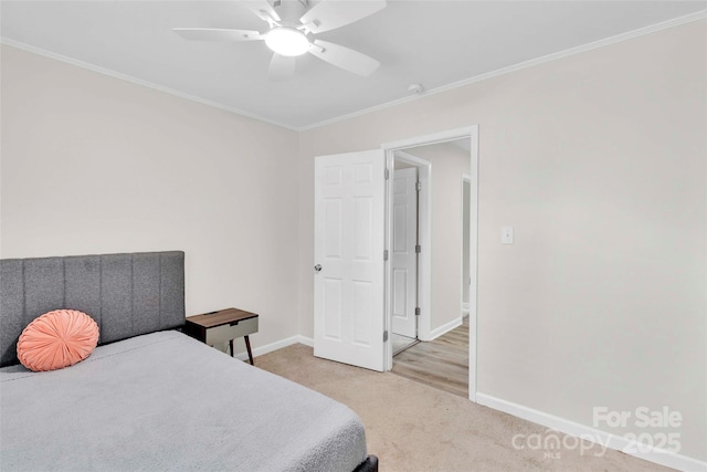 15804 Fairfield Dr, Matthews, NC 28104 - bedroom with crown molding, light carpet, and ceiling fan