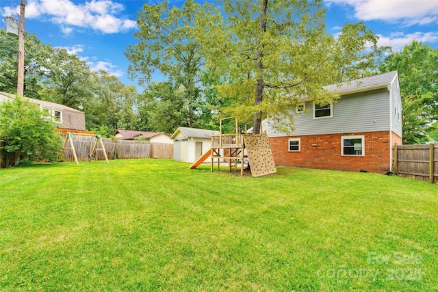 15804 Fairfield Dr, Matthews, NC 28104 - fenced backyard with a playground and a storage shed