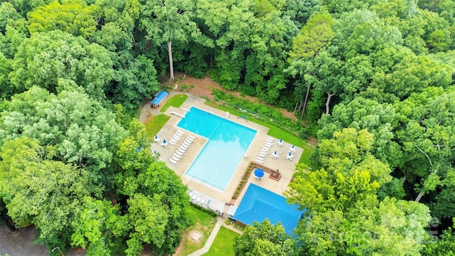 15804 Fairfield Dr, Matthews, NC 28104 - aerial view of property and surrounding area featuring a pool area and a forest
