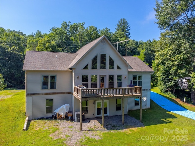 266 Egret Ln, Sylva, NC 28779 - rear view of house with a lawn, a deck, roof with shingles, and french doors