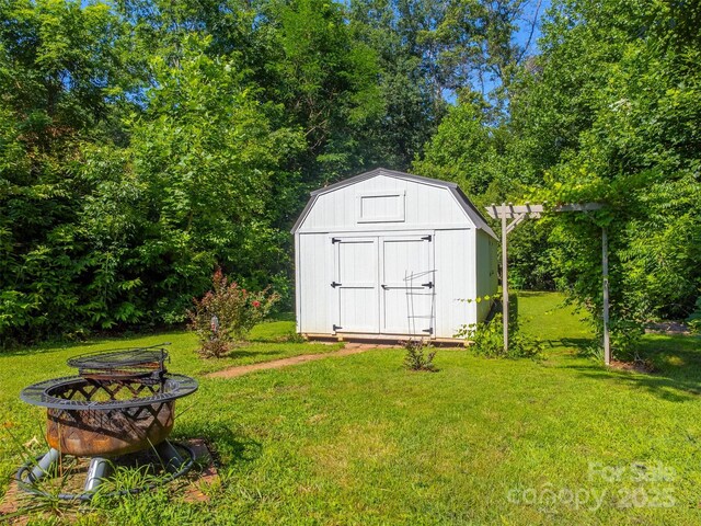 266 Egret Ln, Sylva, NC 28779 - view of shed featuring an outdoor fire pit
