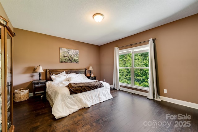 266 Egret Ln, Sylva, NC 28779 - bedroom with dark wood finished floors