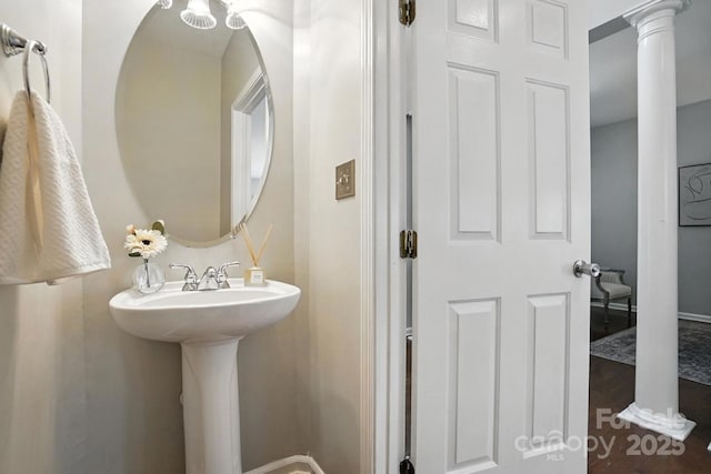 10306 Meadow Crossing Ln, Cornelius, NC 28031 - bathroom featuring wood finished floors and decorative columns