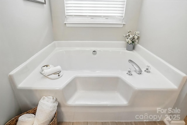 10306 Meadow Crossing Ln, Cornelius, NC 28031 - bathroom with a garden tub