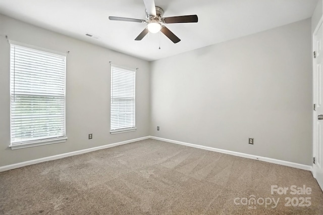 10306 Meadow Crossing Ln, Cornelius, NC 28031 - carpeted empty room featuring a ceiling fan and healthy amount of natural light