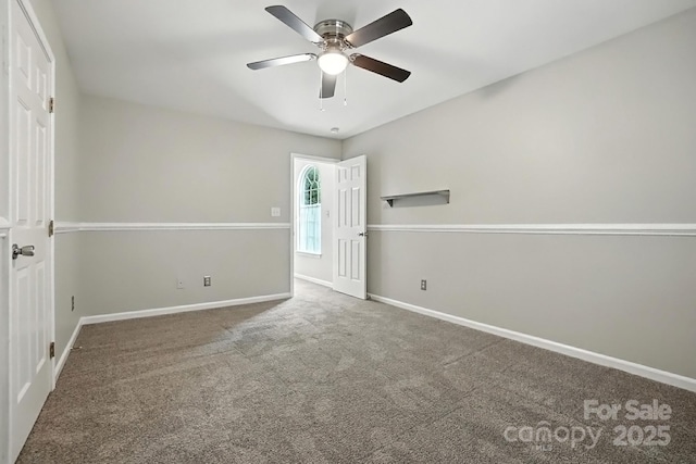 10306 Meadow Crossing Ln, Cornelius, NC 28031 - unfurnished bedroom with carpet and ceiling fan
