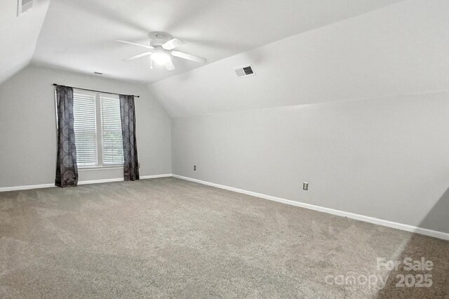 10306 Meadow Crossing Ln, Cornelius, NC 28031 - additional living space featuring vaulted ceiling, a ceiling fan, and carpet