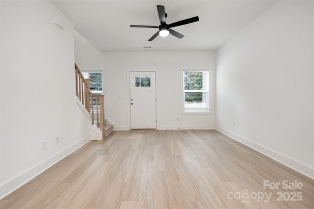 794 Stanley Spencer Mtn Rd, Gastonia, NC 28056 - entryway featuring stairway, light wood-type flooring, and ceiling fan