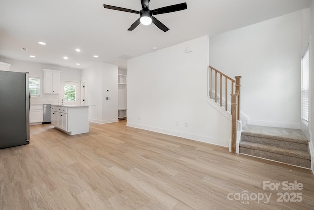 794 Stanley Spencer Mtn Rd, Gastonia, NC 28056 - unfurnished living room with stairs, light wood-style flooring, recessed lighting, and a ceiling fan