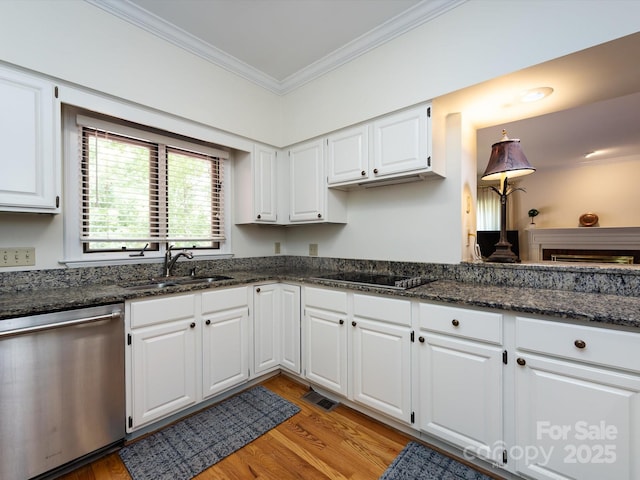 9413 Tillot Dr, Matthews, NC 28105 - kitchen with dishwasher, ornamental molding, light wood-style floors, and white cabinets