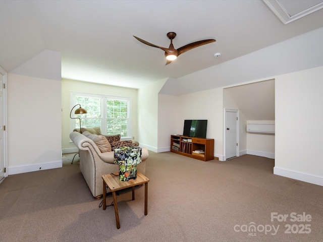 9413 Tillot Dr, Matthews, NC 28105 - carpeted living area with a ceiling fan and vaulted ceiling