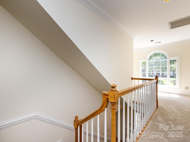 9413 Tillot Dr, Matthews, NC 28105 - hallway featuring ornamental molding, an upstairs landing, and carpet