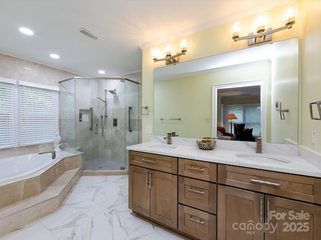 9413 Tillot Dr, Matthews, NC 28105 - ensuite bathroom with double vanity, a bath, a stall shower, marble finish floors, and recessed lighting