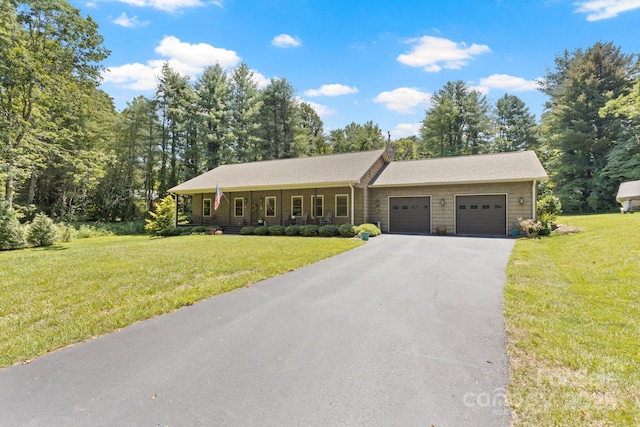 99 Pinecrest Estates Dr, Flat Rock, NC 28731 - ranch-style house with a garage, driveway, and a front yard