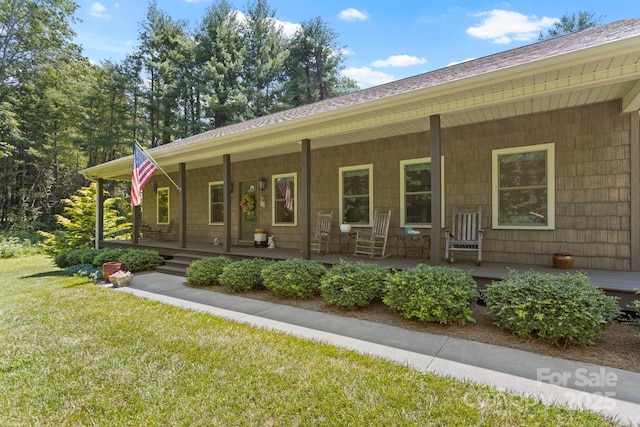 99 Pinecrest Estates Dr, Flat Rock, NC 28731 - view of front of property featuring a porch and a front yard