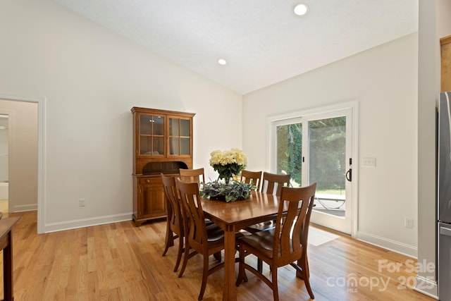 99 Pinecrest Estates Dr, Flat Rock, NC 28731 - dining room with lofted ceiling, light wood-type flooring, and recessed lighting