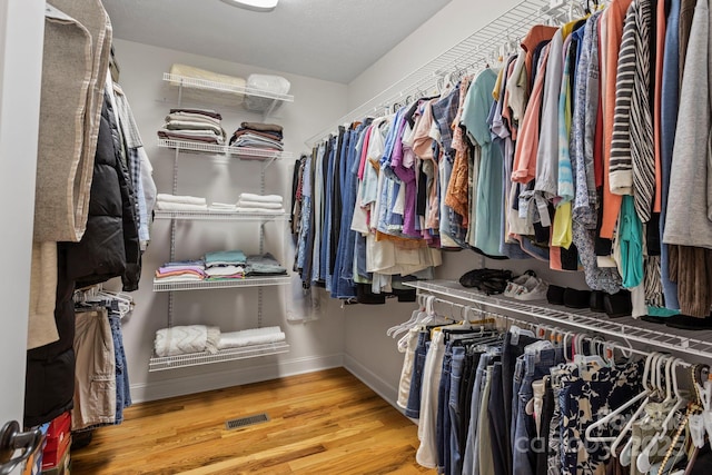 99 Pinecrest Estates Dr, Flat Rock, NC 28731 - walk in closet with wood finished floors