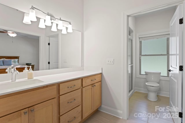 99 Pinecrest Estates Dr, Flat Rock, NC 28731 - full bathroom featuring vanity, a shower stall, ceiling fan, ensuite bath, and tile patterned floors