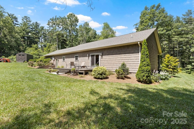 99 Pinecrest Estates Dr, Flat Rock, NC 28731 - back of property featuring a deck, a shed, a yard, and a shingled roof