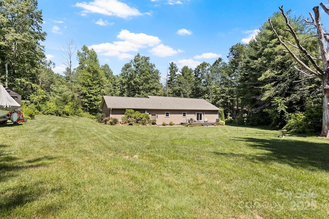 99 Pinecrest Estates Dr, Flat Rock, NC 28731 - view of green lawn featuring a view of trees