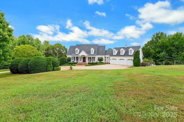 340 Harrison Rd, Roebuck, SC 29376 - new england style home with driveway, a front yard, and an attached garage