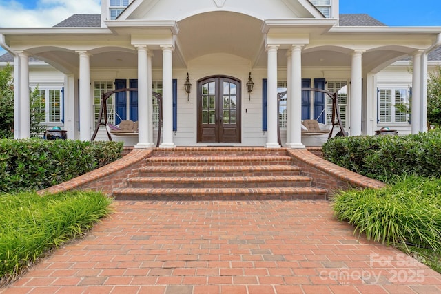 340 Harrison Rd, Roebuck, SC 29376 - doorway to property with covered porch, roof with shingles, and french doors