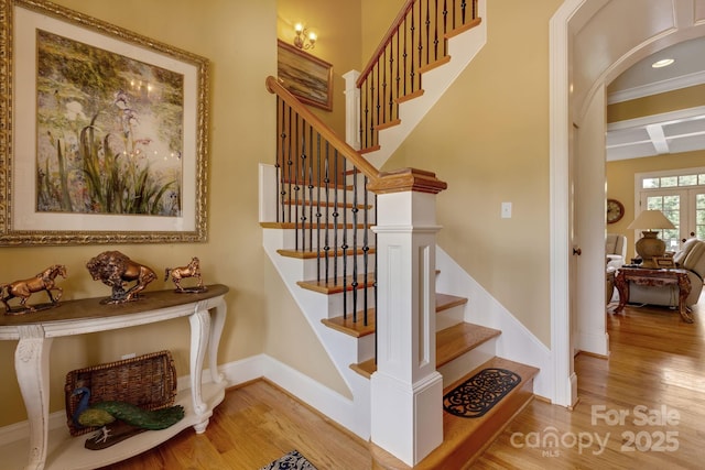 340 Harrison Rd, Roebuck, SC 29376 - stairway with wood finished floors, arched walkways, beam ceiling, and coffered ceiling