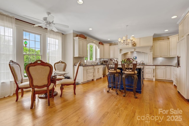 340 Harrison Rd, Roebuck, SC 29376 - kitchen featuring plenty of natural light, a chandelier, a center island, tasteful backsplash, and recessed lighting
