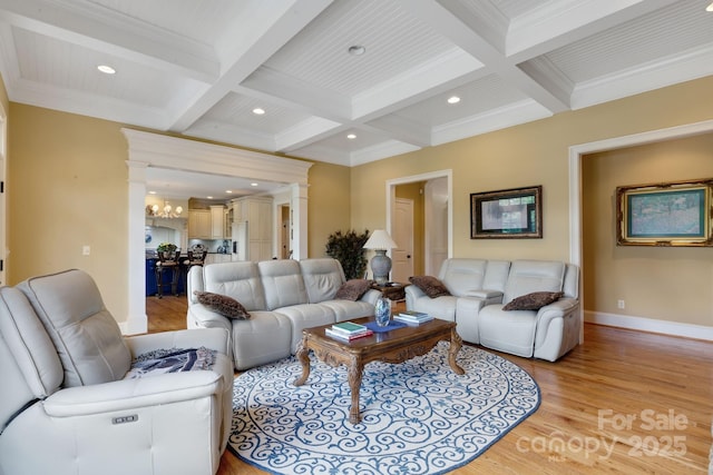 340 Harrison Rd, Roebuck, SC 29376 - living room featuring light wood-type flooring, beamed ceiling, coffered ceiling, crown molding, and ornate columns