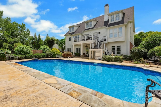 340 Harrison Rd, Roebuck, SC 29376 - swimming pool featuring stairway and a patio