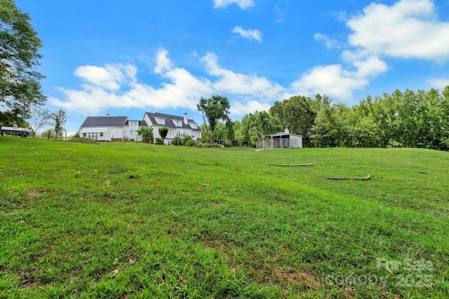 340 Harrison Rd, Roebuck, SC 29376 - view of green lawn with an outbuilding