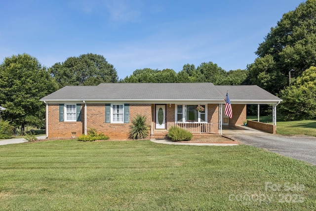 121 Kee Rd, Belmont, NC 28012 - ranch-style house featuring brick siding, driveway, a front yard, and an attached carport