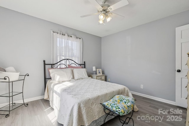 121 Kee Rd, Belmont, NC 28012 - bedroom with wood finished floors and ceiling fan