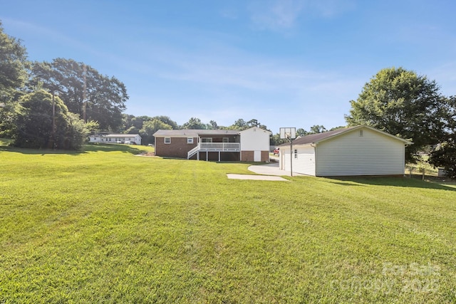 121 Kee Rd, Belmont, NC 28012 - view of grassy yard featuring stairs, a deck, and an outbuilding