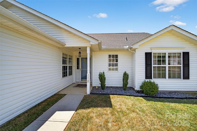118 Milroy Ln Unit 171, Mooresville, NC 28115 - doorway to property featuring roof with shingles and a yard