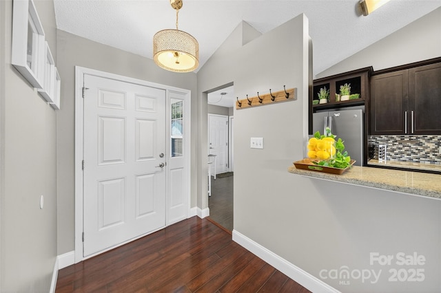 118 Milroy Ln Unit 171, Mooresville, NC 28115 - foyer entrance featuring dark wood-style floors and lofted ceiling