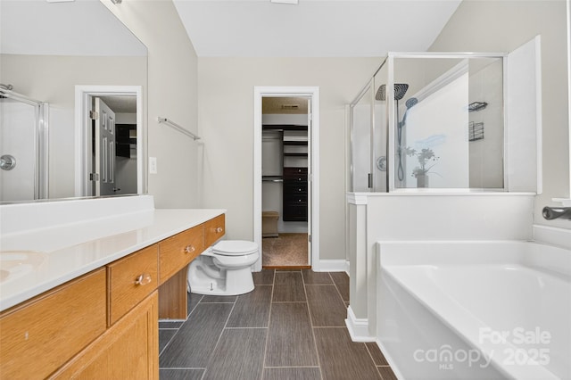 118 Milroy Ln Unit 171, Mooresville, NC 28115 - full bathroom featuring a shower stall, a garden tub, vanity, and a spacious closet