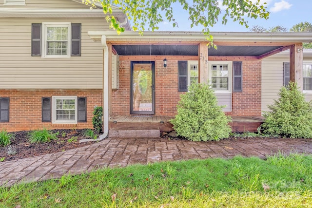 213 Turkey Hill Dr, King, NC 27021 - property entrance featuring brick siding and covered porch
