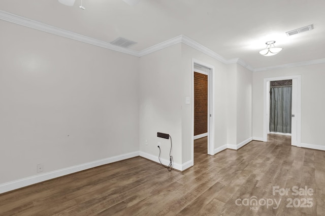 213 Turkey Hill Dr, King, NC 27021 - unfurnished room featuring wood finished floors, ornamental molding, and ceiling fan