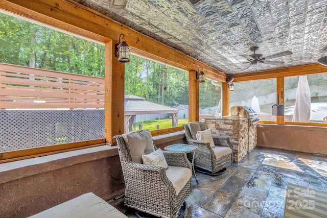 213 Turkey Hill Dr, King, NC 27021 - sunroom with exterior kitchen and a ceiling fan