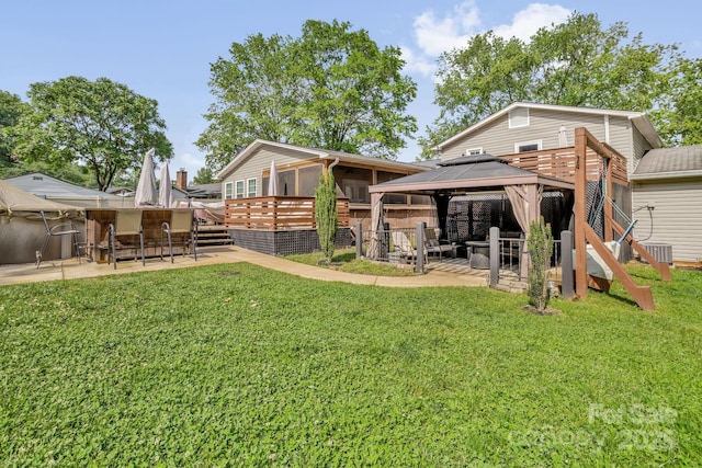 213 Turkey Hill Dr, King, NC 27021 - rear view of house featuring a gazebo, a patio, a deck, and a yard