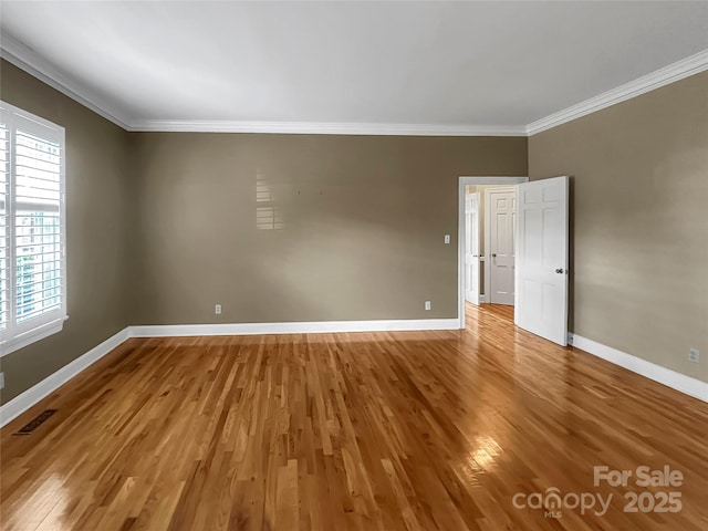 208 N Gaston St, Kings Mountain, NC 28086 - unfurnished room featuring ornamental molding and wood finished floors