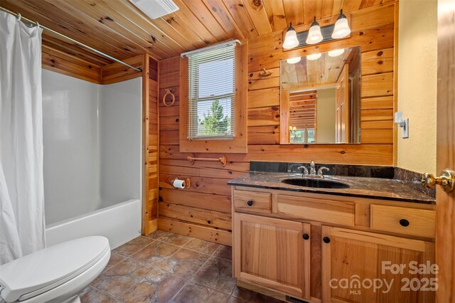 599 Shoal Creek Trl, Nebo, NC 28761 - bathroom with vanity, wood walls, and shower / bathtub combination with curtain