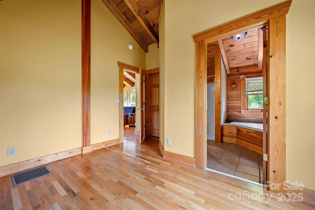 599 Shoal Creek Trl, Nebo, NC 28761 - bathroom with wooden ceiling, wood finished floors, and a garden tub