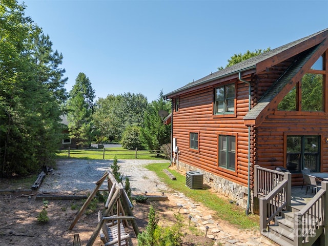 599 Shoal Creek Trl, Nebo, NC 28761 - view of side of property featuring log exterior, a wooden deck, and driveway