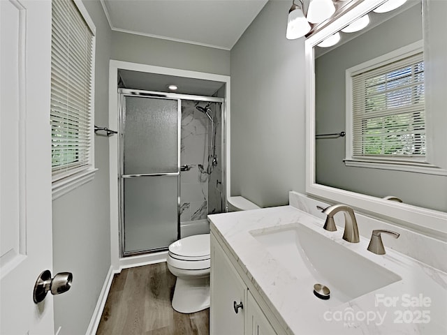 7420 Castlebar Rd, Charlotte, NC 28270 - bathroom featuring a shower stall, vanity, and wood finished floors