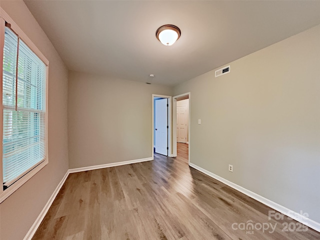 7420 Castlebar Rd, Charlotte, NC 28270 - unfurnished room featuring wood finished floors and baseboards