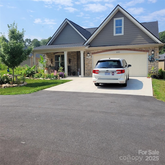 835C Wynnshire Dr Unit 45, Hickory, NC 28601 - view of front of property with driveway, an attached garage, stone siding, and covered porch